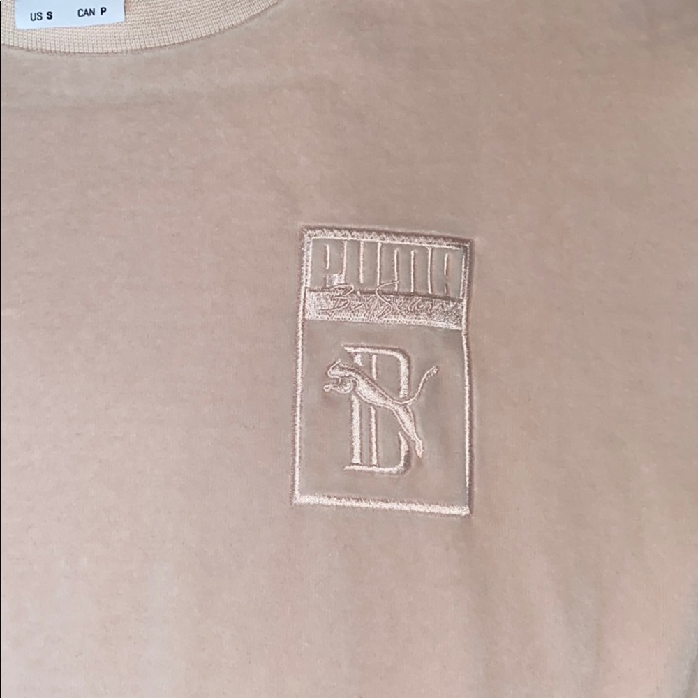 Puma light pink velvet t shirt.